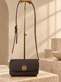 Michael Kors Nolita Small Flap Chain Crossbody — Brown — cream and beige studio background