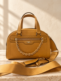 Michael Kors Williamsburg Small Bowling Satchel — Golden Rod — cream and beige studio background